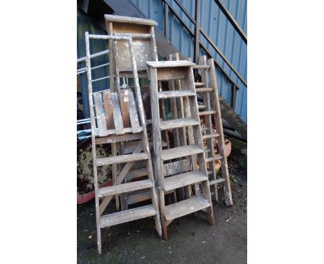 Four vintage wooden step ladders and another - for display use