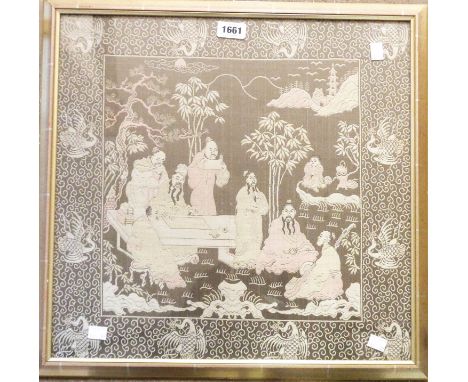 A framed oriental machine tapestry panel, depicting court figures in a garden within a decorative border