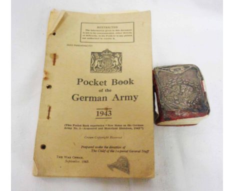 A 1943 British Army Field Service Pocket Book on The German Army - sold with a silver bound Common Prayer book, silver damage