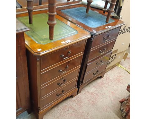 Two similar reproduction mahogany filing cabinets with green leather inset tops and double dummy drawer fronts, set on bracke