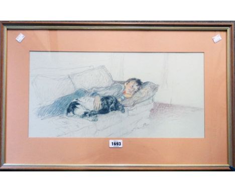 A framed drawing, depicting a boy and spaniel lying on a sofa