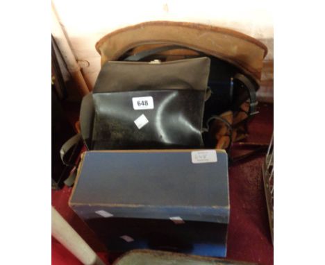 A Polaroid camera and a Sanyo cine camera in an old Kodak bag - sold with a Holiday II cine camera