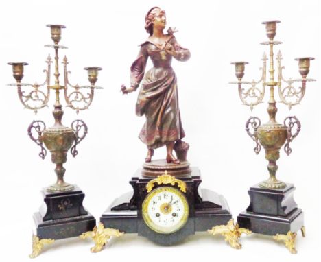 A late Victorian black slate clock garniture with painted spelter figure of a young lady and decorative dial to clock with Fr