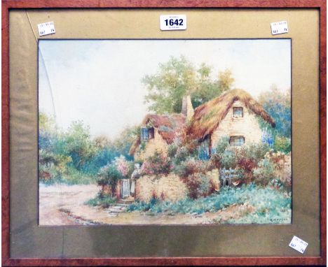 G.K. Mason: a framed watercolour, depicting a figure stood at the gate to a thatched cottage with summer garden - signed - gl