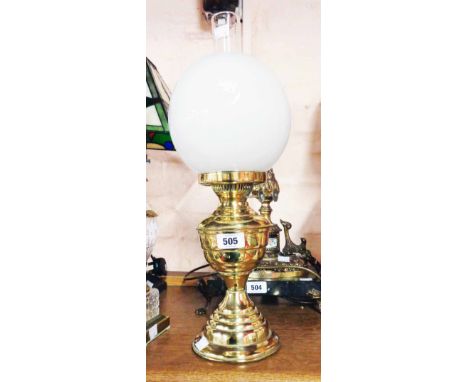 An Aladdin twin burner brass oil lamp