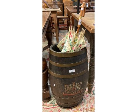 Vintage oak and brass banded coopered barrel with Royal by Appointment crest, the interior revealing a vintage floral umbrell