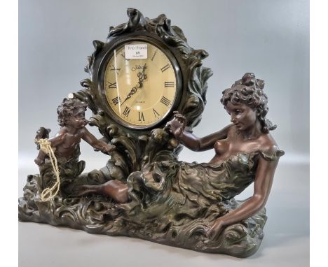 Juliana quartz bronzed mantle clock in Art Nouveau style with figure of semi-nude lady and cherub.  (B.P. 21% + VAT) 