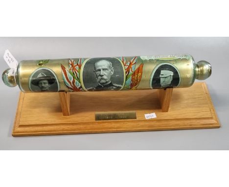 Glass 'The British Leader in the Transvaal War 1899-19' coloured and printed rolling pin on modern wooden stand, the plaque m