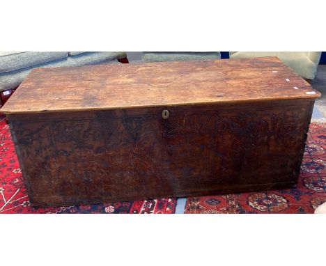 Large 19th century pine trunk with poker work front panel. (B.P. 21% + VAT)  No woodworm.  Heavy wear to the top, marks etc. 