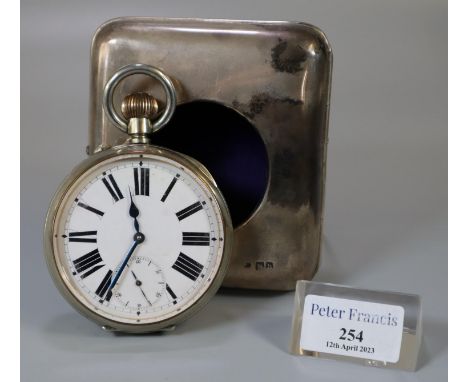 Early 20th century silver Goliath pocket watch with enamel face and Roman numerals in fitted silver easel case/frame.(B.P. 21