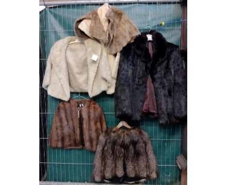Collection of vintage fur items to include: three fur coats; one fox fur, one dark brown and one cream, two stoles; one cream