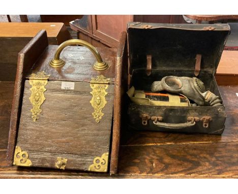 Victorian stained pine Purdonium with brass gothic mounts and brass handle, together with a vintage suitcase the interior rev