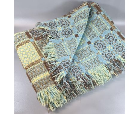 Traditional woollen Welsh tapestry blanket or carthen on bright blue ground with fringed edge.(B.P. 21% + VAT) 