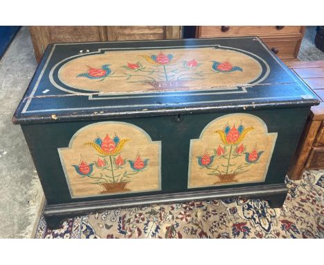 19th century painted pine trunk with floral panels bearing date 1812.   (B.P. 21% + VAT) 