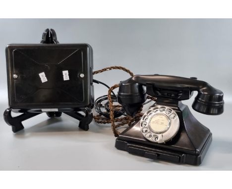 Vintage black GPO telephone on stand with braided cord, appearing to have been converted for modern use. (B.P. 21% + VAT) App
