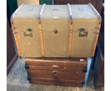 Cane bound canvas covered steamer trunk together with a tin trunk.  (2)   (B.P. 21% + VAT) 