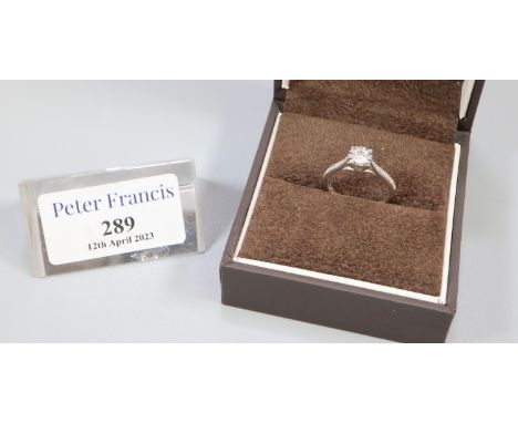 Diamond solitaire ring set in 9ct white gold with diamond shoulders.  Ring size K.  Approx weight 2.8 grams.(B.P. 21% + VAT) 