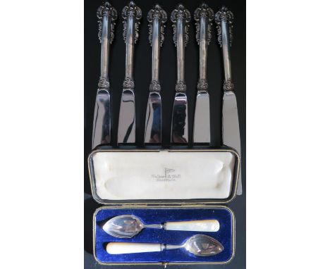 A Cased Pair of George V Silver Egg Spoons with mother of pearl handles Sheffield 1914 Walker &amp; Hall and six Peruvian Cam