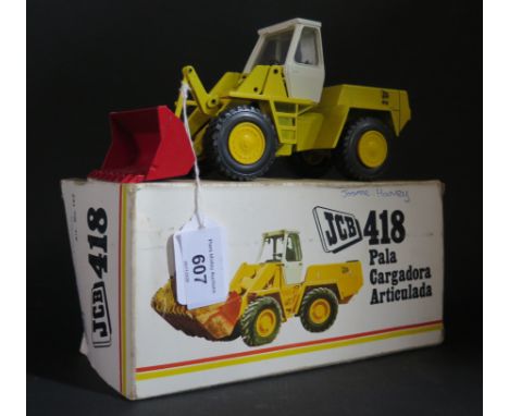 A NZG No. 142 JCB 418 Excavator 1:35 Scale. Excellent in good box with pen marks.