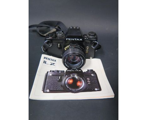 A Vintage Pentax SLR Film Camera with SMC Pentax-M 1:1.4 50mm Lens with manual 