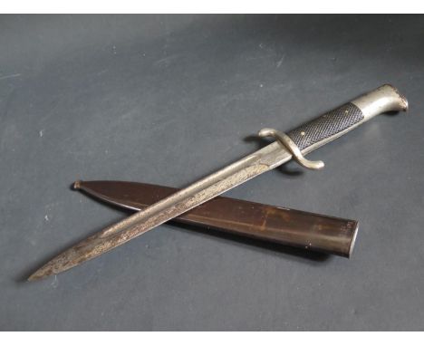 A German WWII Fire Brigade Bayonet with scabbard stamped E.u.F Horsler 1940 