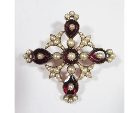 A Georgian Garnet and Pearl Brooch in an unmarked gold setting, 49mm, 10g 