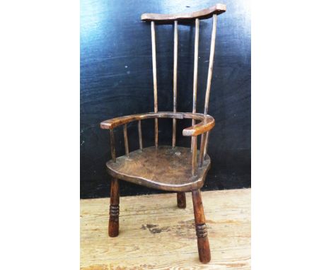 A Child's Elm Seated Comb Back Chair 