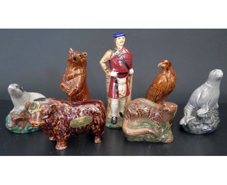 A Collection of Beneagles and Rutherford's Scotch Whisky in Beswick Figurine Decanters (badger empty) and Courvoisier Cognac 