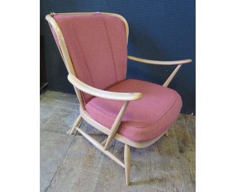 A Light Ercol Open Armchair 