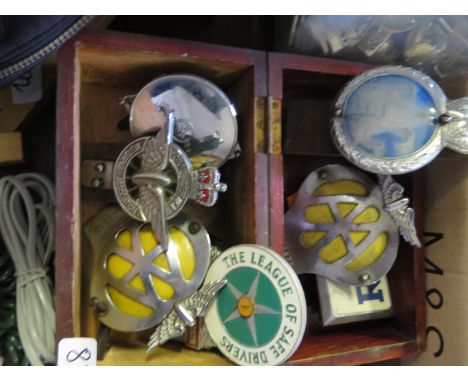 A Civil Service Motoring Association Enamel Badge, two AA badges, two RAC badges and League of Safe Drivers badge 