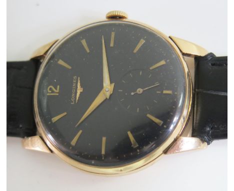 A Gent's Longines Manual Wristwatch in an 18k gold 37mm case, 12.68z movement no. 9535773, running 