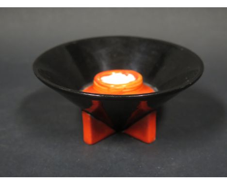 A Clarice Cliff Yoyo Black and Red Conical Candlestick, 1930/31
