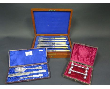 A Cased Three Piece Christening Set with mother of pearl handles, Walker &amp; Hall, A Cased Pair of Electroplated Silver Kni