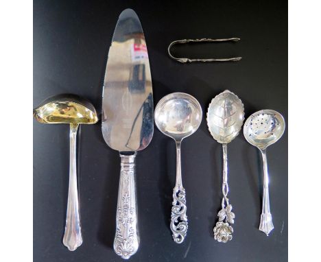 A Swedish Silver Sauce Ladle, two spoons and sugar tongs (118g), Sheffield silver sugar sifting spoon (28g) and silver handle