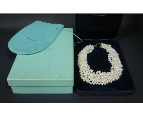 A Tiffany &amp; Co Eight Strand Pearl Necklace with 18K Gold Clasp, c. 42cm long, 208g, boxed and with hard case 