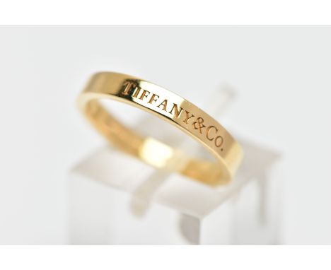 A 'TIFFANY &amp; CO.,' BAND RING, signed Tiffany &amp; Co., stamped Au750, ring size L 1/2, approximate gross weight 3.90 gra
