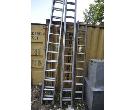 TWO ALUMINIUM SINGLE EXTENSION LADDERS, and a wooden extension ladder with aluminium steps (3)