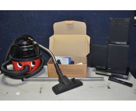 A HENRY HVR200M NUMATIC VACUUM CLEANER with box of attachments and spare bags (PAT pass and working) along with a Humax HDR20