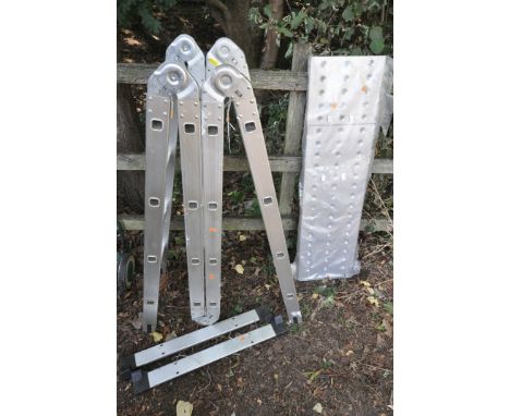 AN UNBANDED ALUMINIUM FOLDING MULTI-PURPOSE LADDER, with an extending platform, and two loose supports