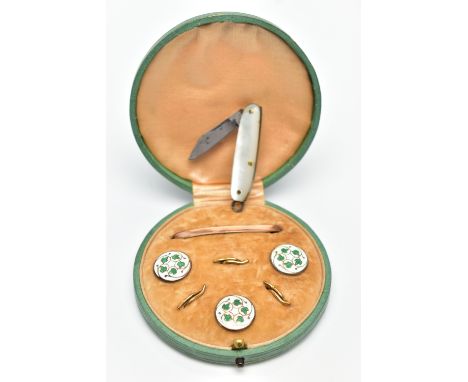 A CASED SET OF 'LAWSON WARD &amp; GAMMAGE' ENAMEL DRESS STUDS, to include three circular dress studs, each designed with a wh