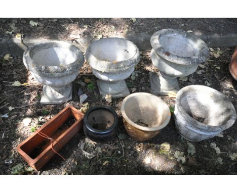 A PAIR OF COMPOSTE CAMPAGNA GARDEN URNS, diameter 38cm x height 36cm (condition:-both with either cracks and repairs, one urn