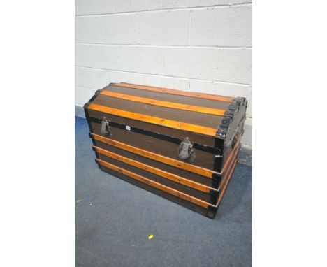 A VINTAGE CANVAS, WOODEN AND METAL BANDED DOMED TOP TRUNK, width 93cm x depth 54cm x height 63cm (condition:-worn finish and 