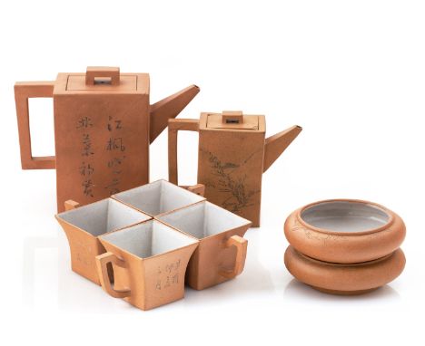 A CHINESE EIGHT-PIECE YIXING TERRACOTTA TEA SERVICE, 20TH CENTURY the set with stylized geometric forms, the obverse of each 