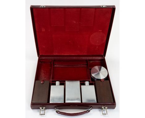 A HERMES MEN'S LEATHER DECO VANITY CASE, CIRCA 1930S claret-red leather with palladium hardware, with sectioned interior, pai