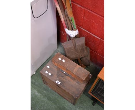 An engineer's toolbox and tools; garden tools.