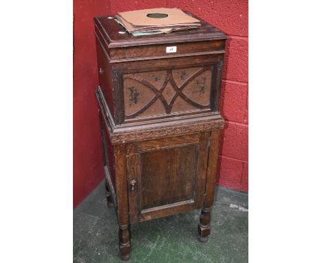 An Art Deco H M N floor standing gramophone cabinet, c.1930; records en suite 