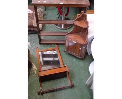 An Edwardian stained pine wall unit with mirror, box and towel rail; a small wall mounted corner cabinet; an oak wall shelf (