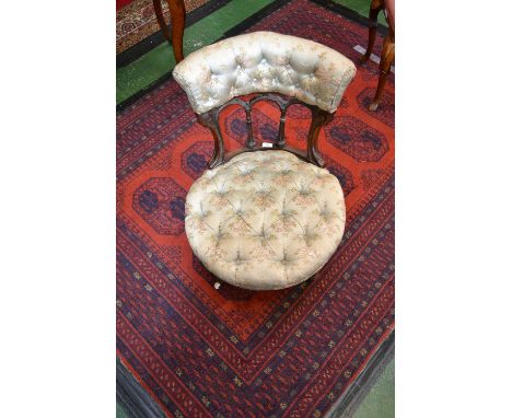 A mid-Victorian mahogany and silk salon chair, ceramic castors, c,1860 