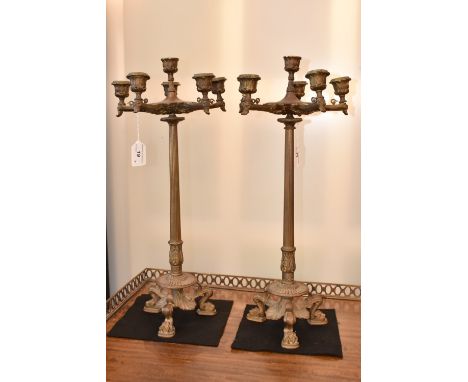 A pair of 19th century Grecian Revival 'Grand Tour' six-light table candelabra, each candelabrum with lotus cast sconces, aca
