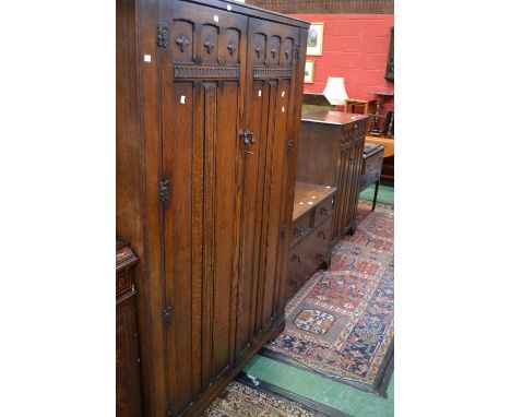 An oak Crown AY furniture three piece bedroom suite comprising double wardrobe; dressing chest and tallboy; an oak dresser ba